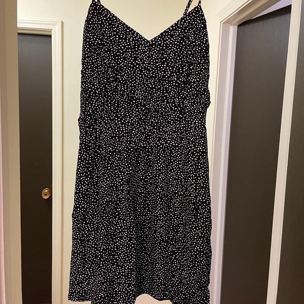 Mid length black and white spotted dress